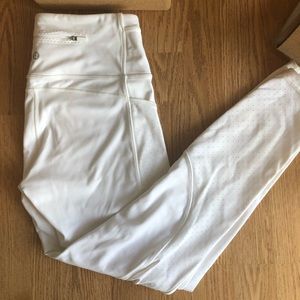 EUC Lululemon Perforated White Reflect Crops 24”